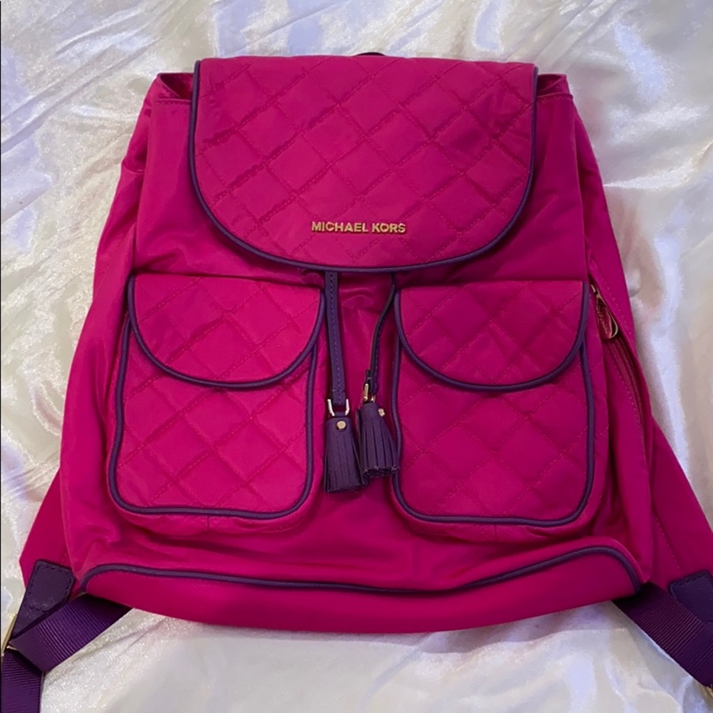 Michael Kors backpack with laptop slot.